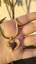 Stainless steel necklace with gold plated pendant